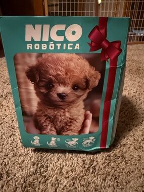 NICO Robótica puppy plush in Teal Gift Box with Red Ribbon and Puppy Image